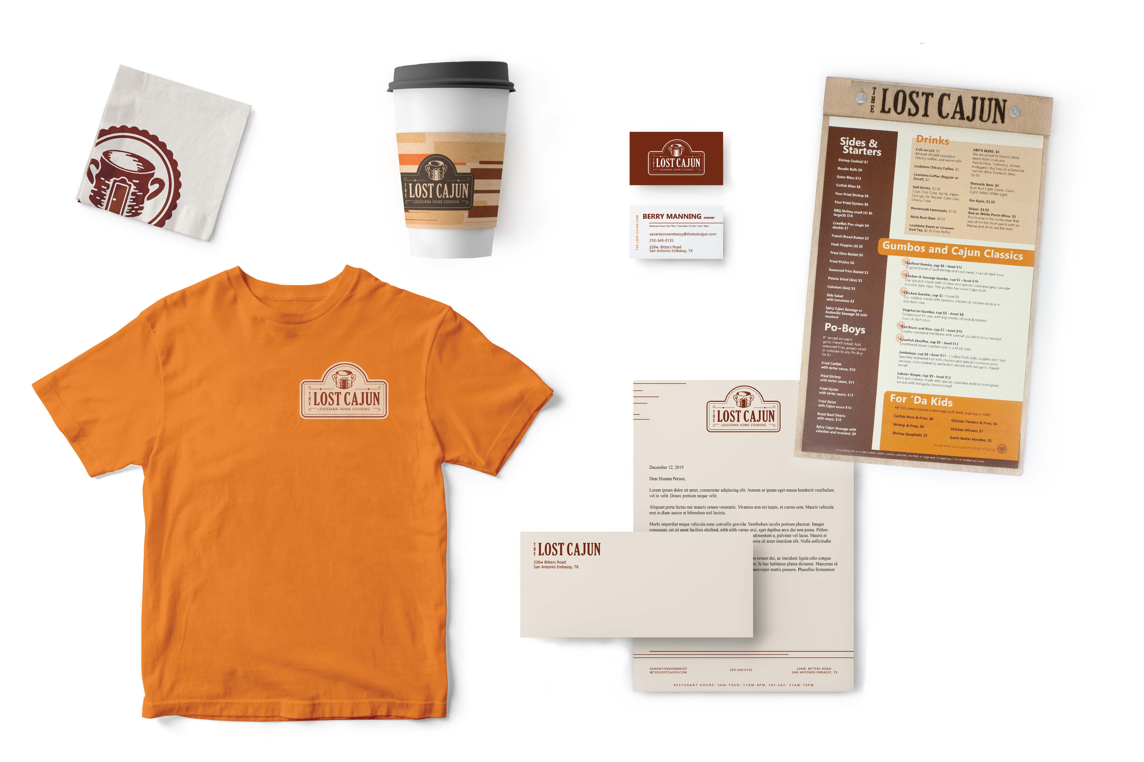 an array of products displayed with The Lost Cajun re-designed logo; a shirt, disposable cup, menu, business cards, etc.